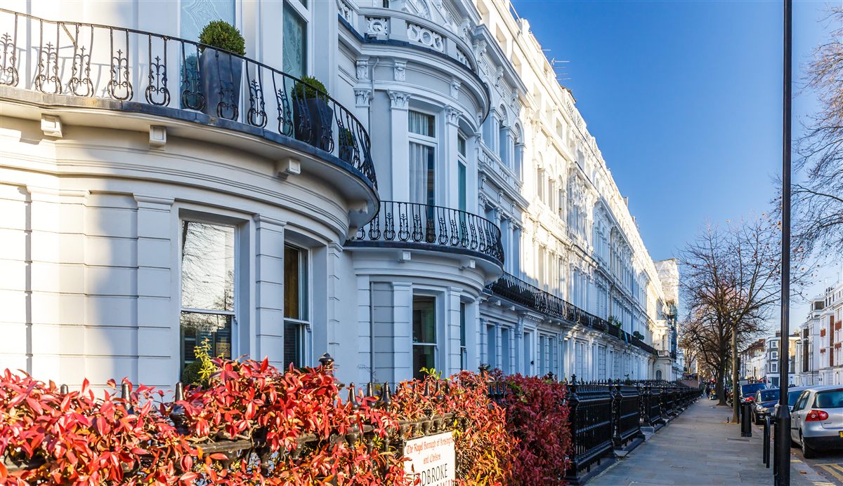 Elegant white stucco townhouses in London